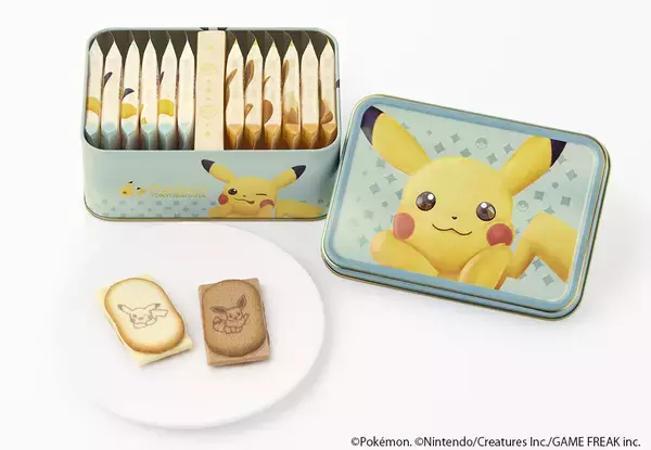 「「ポケモン東京ばな奈 スペシャル缶」発売、ピカチュウ&イーブイの“はみ出しチョコのクッキーサンド”入り、缶や特典ステッカーには様々な顔のピカチュウをデザイン」の画像