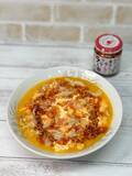 「豚肉の旨みとトマトの爽やかな酸味に食べるラー油が絶妙に絡み合う」の画像5