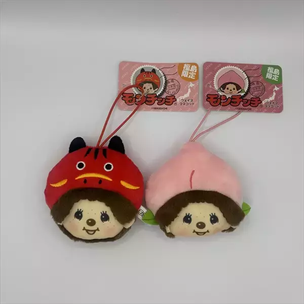 「【福島限定！人気の赤べこに続くご当地シリーズ第2弾】モンチッチが「桃」に変身！フェイスマスコットが12月下旬に発売」の画像