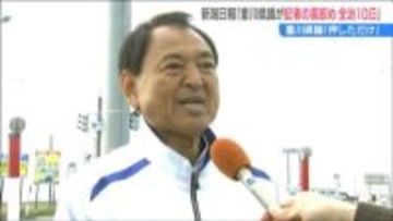 新潟日報「記者が重川 県議から首を絞められ全治10日のけが」と報道　「通路をふさがれたので記者の体を押したが首は絞めていない」と暴行を否定