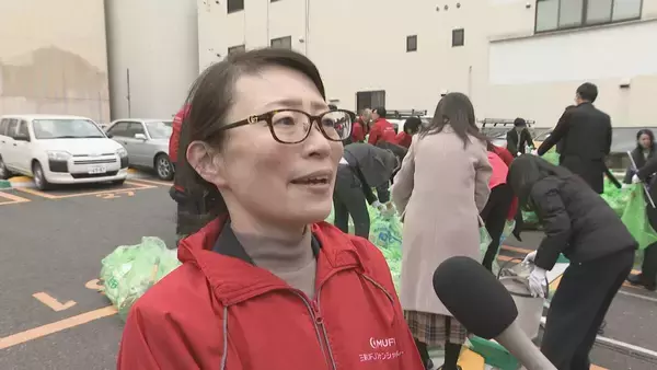 「｢心をきれいに新年を｣ クリスマス翌日の名古屋･栄で約500人がごみミ拾い 出勤前の30分で120袋分のごみ集まる アジア大会見据え美化意識の向上目指す」の画像