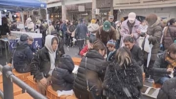 三重・熊野市　　　雪の中で　熊野きのもと「さんま祭り」