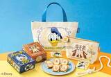 「東京ばな奈より「ドナルドダック、チップ＆デール/ショコラサンド『見ぃつけたっ』」が5月20日から再登場ランチトートバッグやポーチの新作グッズも販売」の画像1