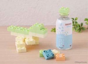 ペットボトルのキャップが遊べるブロックトイの天然水　おもちゃショーでお披露目