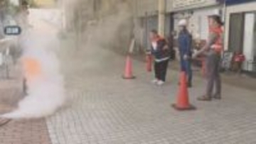 戸畑区の商店街に響く“サポ笛”　地域ぐるみで消防訓練