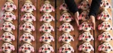 「えべっさん」に向けえびす面が製作最盛期　業者「笑って過ごせるよう願い込め」