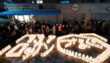 子どもらにつなぐ「1.17の記憶」　商店街に紙灯籠ともし、犠牲者を追悼　神戸・長田でつどい