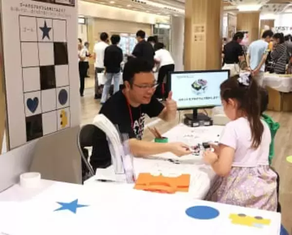 京都市中京区の商業施設でなぜ世界的研究者が解説を？難しい研究内容を自らの言葉で語るワケ