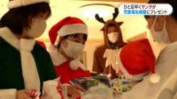 サンタがプレゼントを持ってやって来た！ロータリークラブが乳児院にクリスマスプレゼント　鹿児島