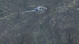 「森林の早期回復で二次災害防止へ、山火事発生の地区でヘリコプターによる種まき 愛媛・今治市」の画像1