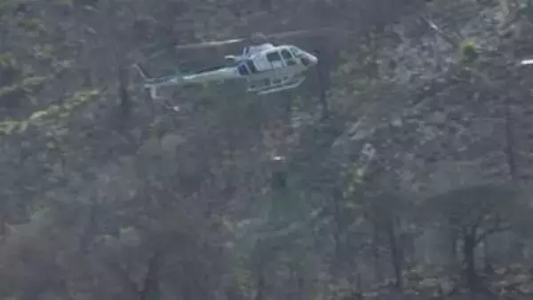 森林の早期回復で二次災害防止へ、山火事発生の地区でヘリコプターによる種まき 愛媛・今治市