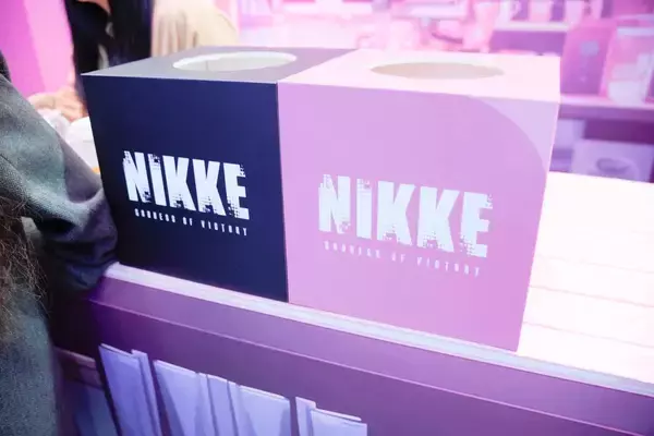 「【TGS2026】「勝利の女神：NIKKE」ブースをフォトレポート！グッズや美麗コスプレイヤーたちで大盛況」の画像