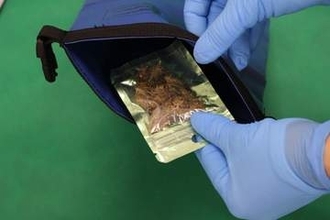 「持ち込んだのは菓子」と容疑否認　麻薬成分THC含む固形物を密輸か　ポーチに隠してタイから福岡へ　30歳男を逮捕