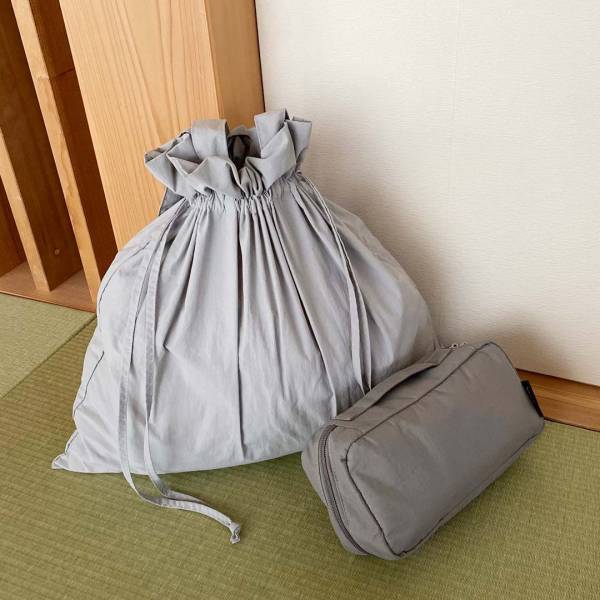 見られたくない下着類もスマートに持ち歩き。温泉旅行が快適スマートになる“巾着サブバッグ”[PR]