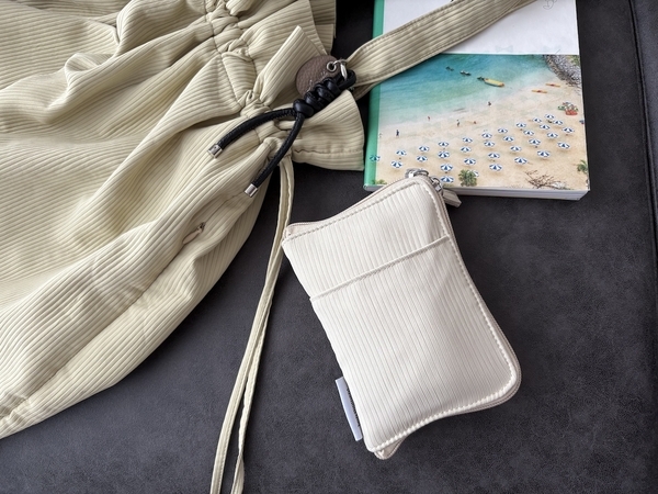 収納上手な４in１。小物迷子がなくなる「手帳型ミニポーチ」、スタッフは旅にも趣味にも愛用中〜[PR]