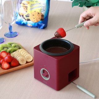 フォークレストのついたキューブ型フォンデュメーカー