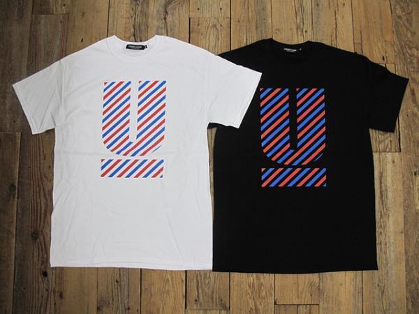 アンダーカバー、新宿伊勢丹で“旅”をテーマにポーターとコラボ。あのチェリーもTシャツに