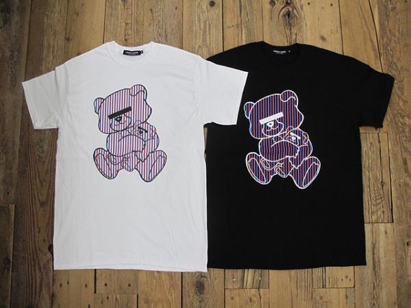 アンダーカバー、新宿伊勢丹で“旅”をテーマにポーターとコラボ。あのチェリーもTシャツに