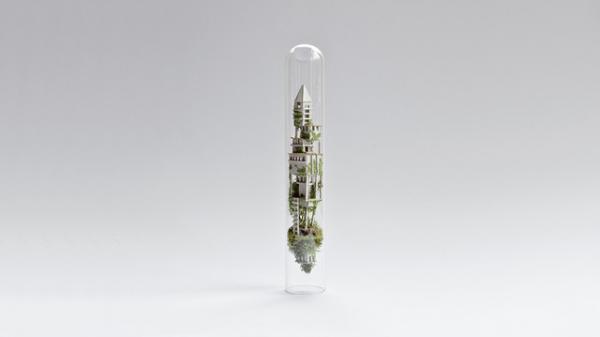 指先から生まれるミニチュア世界、試験官の中に収められた景観の一角