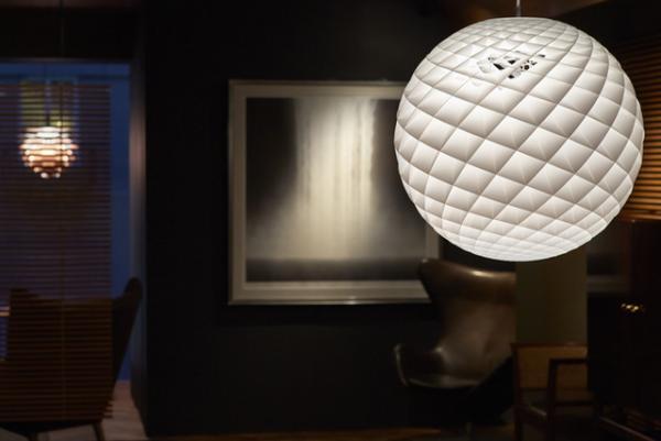 エッグチェアが彫刻作品とコラボした1日限りの展示会を銀座で開催。革張り職人の実演イベントも