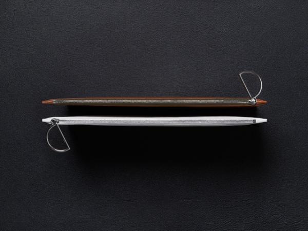 アクネ ストゥディオズ、ジャック・ピアソンとのコラボポーチを世界100個限定発売