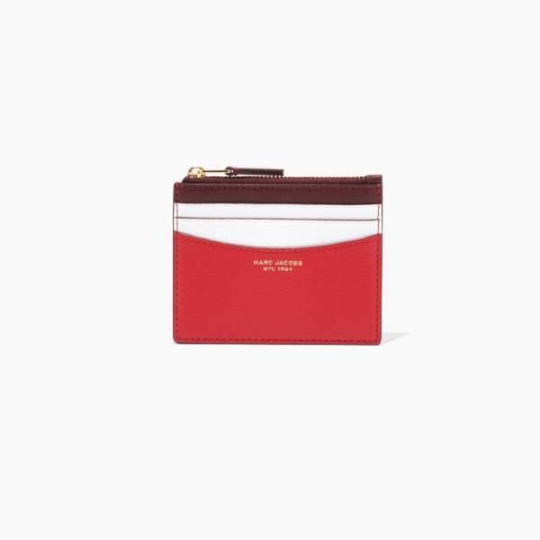 マーク ジェイコブスから、ブランド誕生年の1984年から名付けられた新作スモールレザーグッズ「SLIM 84」が登場