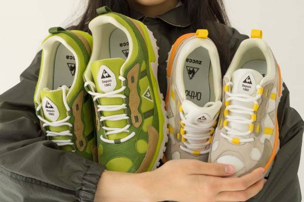 ズッカ × ルコックスポルティフのスニーカー、オレンジなどビタミンカラーを配したレトロな佇まい