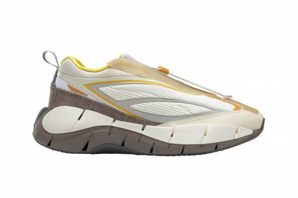 リーボックが英発「コットワイラー」とコラボ、“古代”イメージのスニーカー＆Tシャツなど