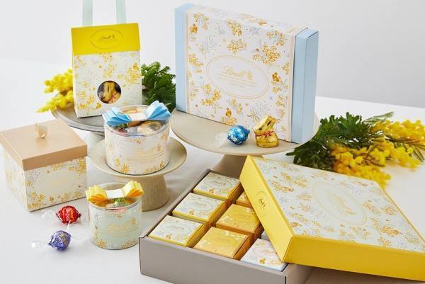 リンツの23年ホワイトデー限定チョコレート、ミモザやカモミールを描いた春色パッケージ