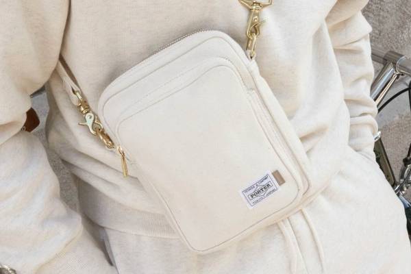 ポーター×ジョウンド“旅の必需品”テーマのコラボバッグや財布、オフホワイトのキャンバスで