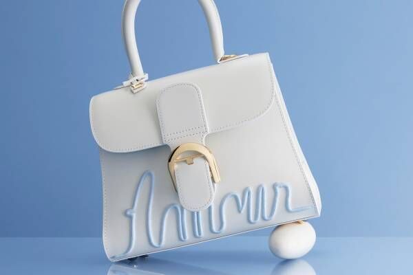 デルヴォー“ルネ・マグリット”のアート着想バッグ、りんごのレザーポーチ＆刺繍を配したハンドバッグ