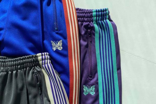 ニードルズ“鮮やかカラー”のトラックパンツ、ステュディオス ウィメンズ別注