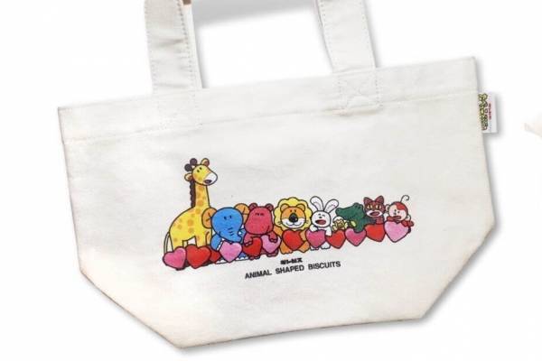 「たべっ子どうぶつ」グッズが大阪・静岡・大分に、ビスケット入りハート柄トート＆刺繍缶バッジ