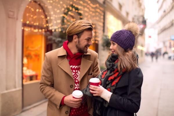 Couple outdoors in winter city.