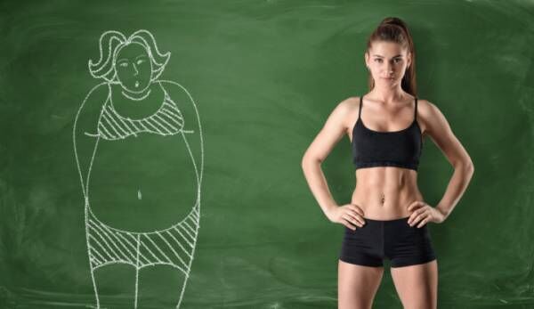 Sporty girl with slim body and picture of fat woman