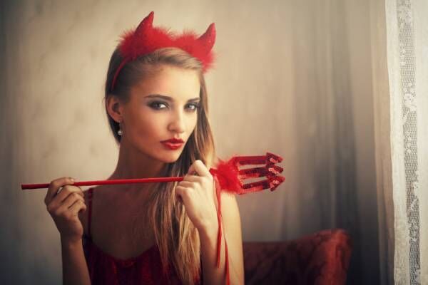 girl wearing devil dress