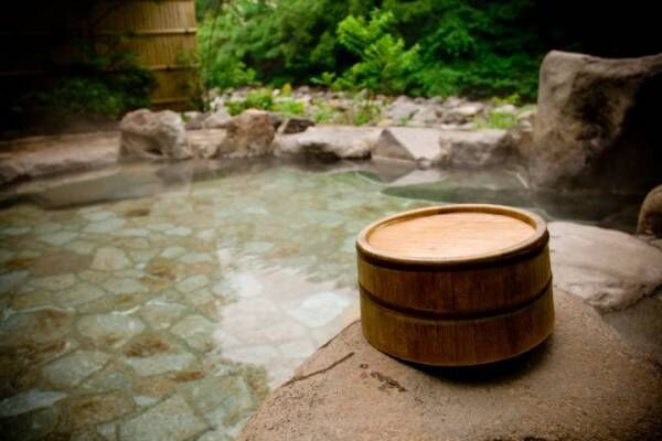 Wooden bucket by a Japanese hot spring bath