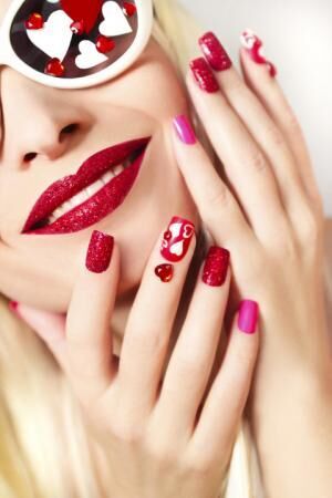 Manicure and makeup with hearts.