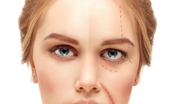 Aging. Mature woman-young woman.Marking the face.Perforation lines on females face, plastic surgery concept.