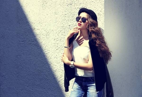 fashion model in sunglasses posing outdoor