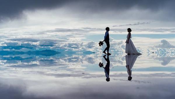 「そんなことある？」ハネムーンに訪れた地で偶然出会ったカメラマンと…全１１枚