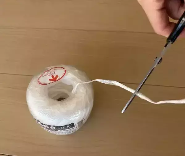 ビニールひもは十字に置いて！　本をガッチリ固定して『一発』でほどく方法に救われた