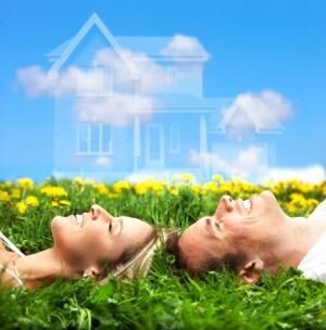 4808161 - young love couple smiling dreaming about a new home. real estate concept