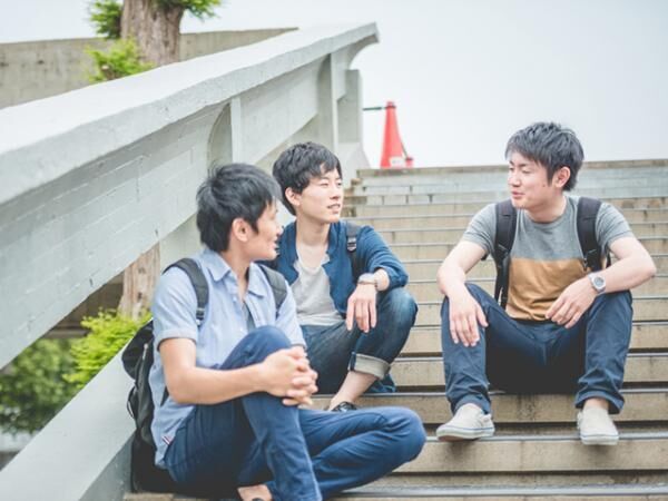 Three Japanese Students Discussing on Staircase, Campus, Kyoto, Japan, Asia