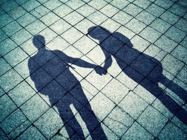 Grunge shadows of couple in love background