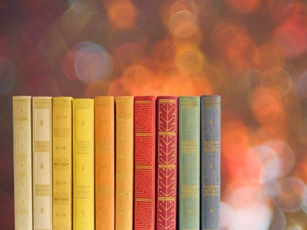 books on blurred nature background,