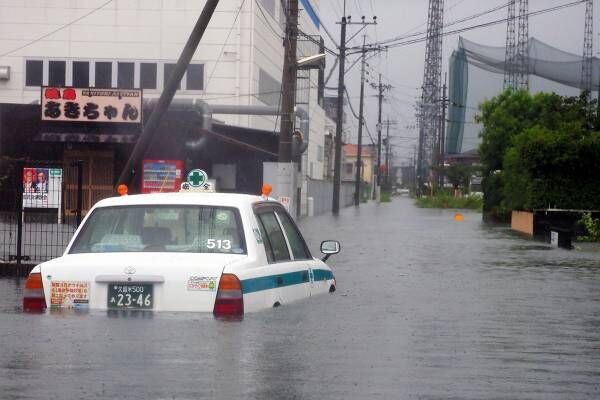 21年、豪雨に見舞われた久留米市の様子（写真：朝日新聞）