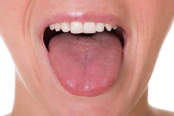 舌が健康のカギ（写真：アフロイメージマート）