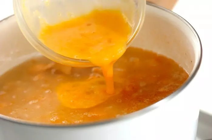 簡単で人気の雑炊 塩鮭と梅 ほっこり胃に優しい by金丸 利恵の作り方2