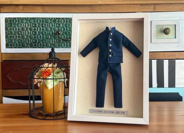 ＜新サービス＞制服をミニチュアリメイクし、額装に入れて提供する「思い出アフレーム」のサイトとサービスのリニューアル